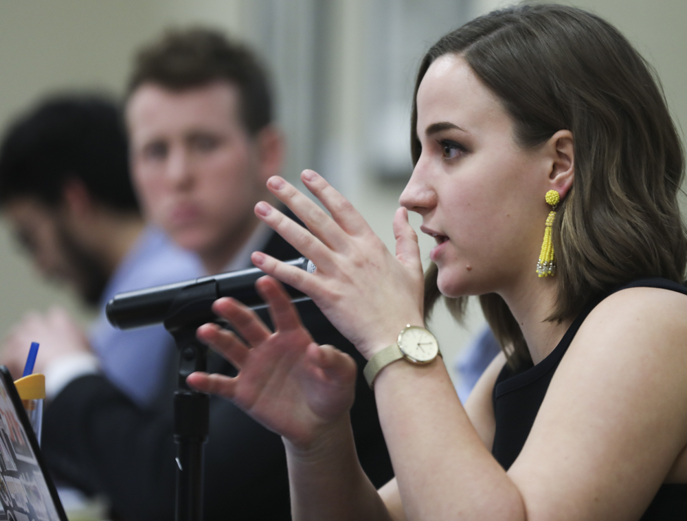 President Paige Hungate answers questions form senators during the SGA meeting where student fees were set to be discussed before being tabled for further discussion.