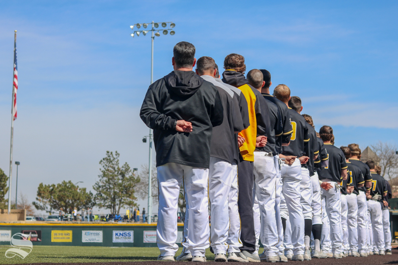 Wichita+State+Baseball+lines+up+for+the+national+Anthem.