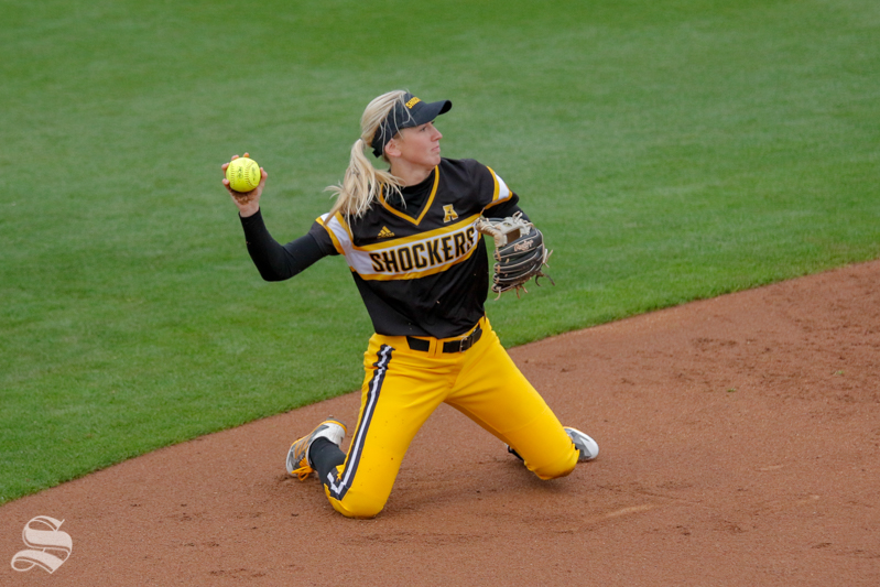 Wichita States Laurie Derrico throws to first base during their game on March 27, 2018 in Stillwater, Oklahoma.