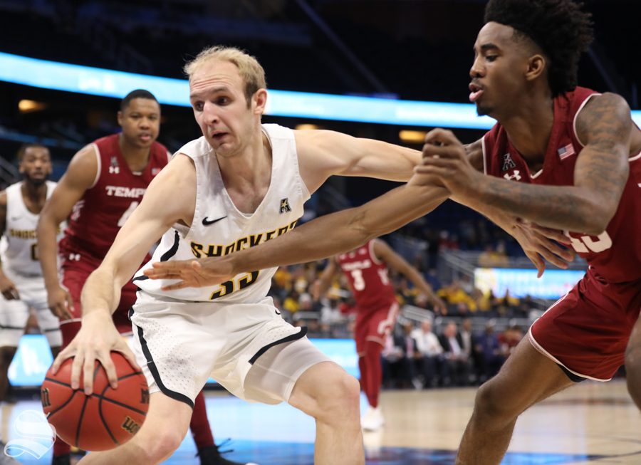 Wichita State guard Conner Frankamp fights for the ball during the Shockers victory over Temple in the American Conference Tournament quarter-finals.