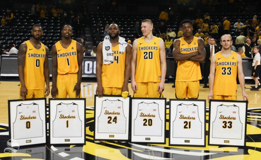 Wichita States Rashard Kelly, Zach Brown, Shaquille Morris, Rauno Nurger, Darral Willis Jr. and Conner Frankamp at Koch Arena. pose while being honored on senior day at Koch Arena.
