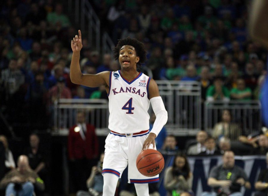 Kansas guard Devonte Graham calls out a play during the first half of the game against Seton Hall in the second round of the NCAA Tournament.