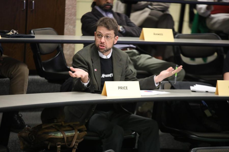 Jay Price speaks at a Faculty Senate meeting in March. Price, a humanities senator, said there seems to be no recourse to say no to decisions made by a nonprofit organization managing Innovation Campus