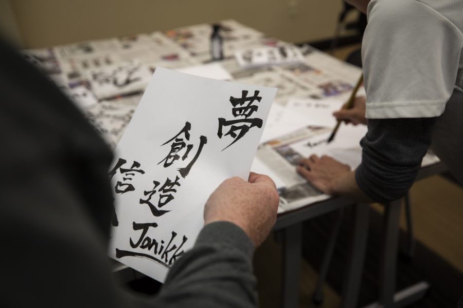 Guest got phrases and their names in Japanese calligraphy at the annual Japan Festival