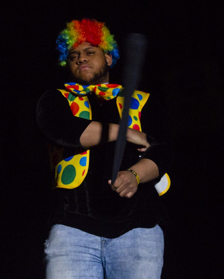 Homie the Clown visits the men of Alpha Phi APlpha Zeta Sigma chpater during their performance.