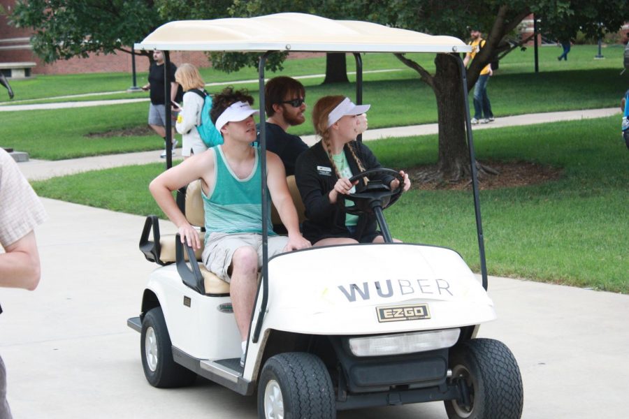 Students catch a ride on Wuber during the first day of classes. 