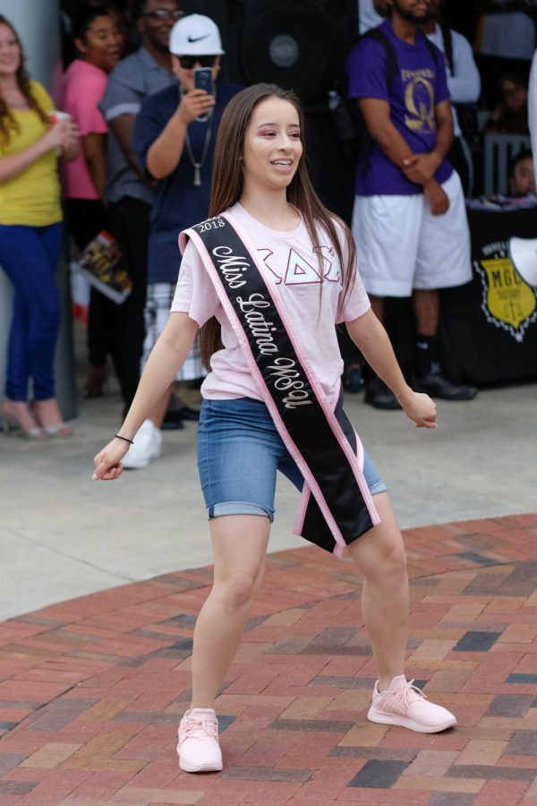 Flor Mercedo, a member of Kappa Delta Chi Sorority majoring in Nursing, performs in the show as Miss Latina WSU.