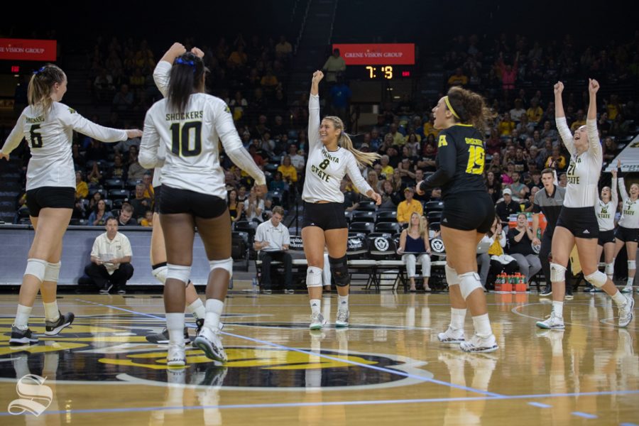 The Shockers celebrate after winning a point during their game against Tulane on Friday evening at Koch Arena. (Sept. 21, 2018)