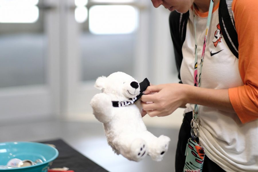 A stuffed polar bear is being dressed with a WSU T-shirt. The polar bear was built at Build-A-Friend event, sponsored by SAC at RSC, on Monday, Sep. 10, 2018. 