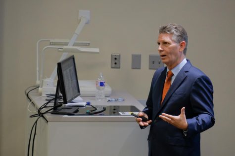 John Woolschlager, a finalist for dean of the College of Engineering, speaks to staffs and faculties on Tuesday, Sept. 25, 2018. His current position is the Director of the Emergent Technologies Institute, Backe chair Eminent School Professor and Director of Engineering Graduate Programs at Florida Gulf Coast University.