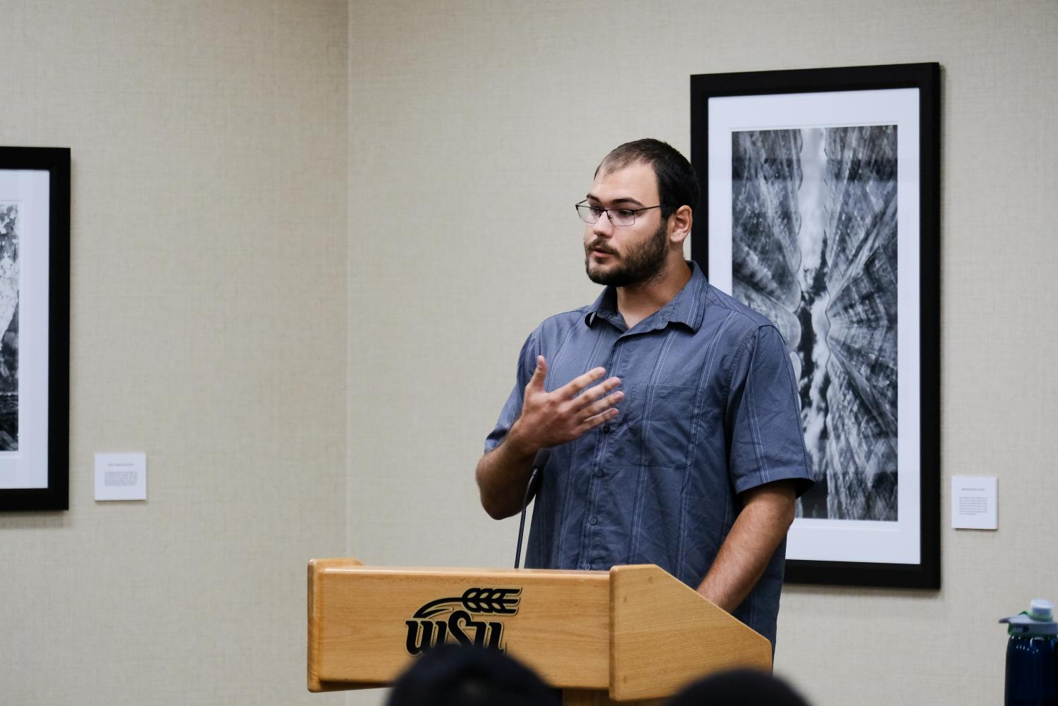 Alex Tackett, president of the currently unrecognized Young Democratic Socials of America chapter at Wichita State, speaks at SGA's Wednesday meeting. YDSA is one of three student organizations seeking recognition from the Senate.