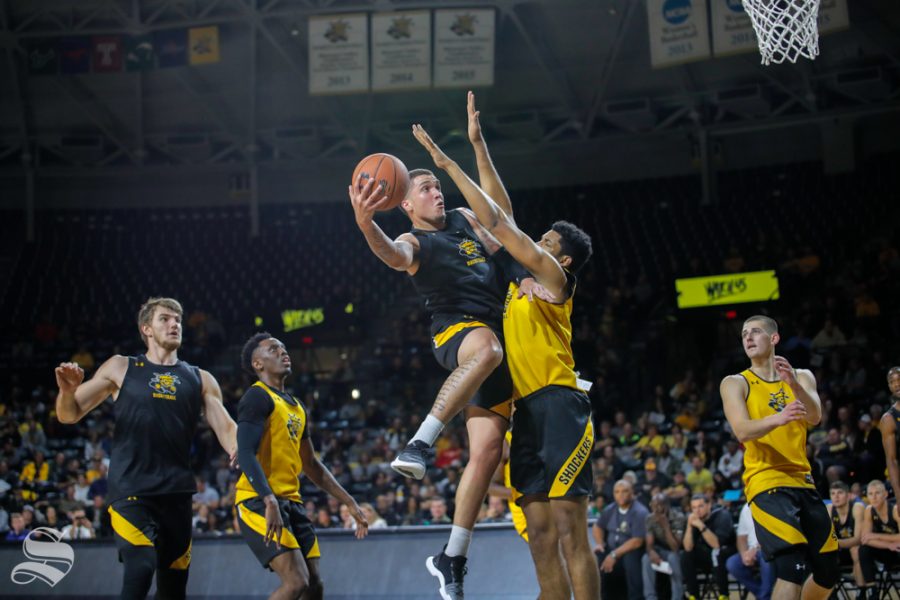 Wichita States Teddy Allen goes up for a basket during the Black and Yellow Scrimmage at Koch Arena on Oct. 6, 2018.