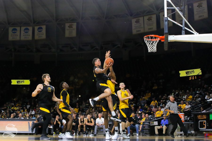 Wichita States Teddy Allen goes up for a basket during the Black and Yellow Scrimmage at Koch Arena on Oct. 6, 2018.