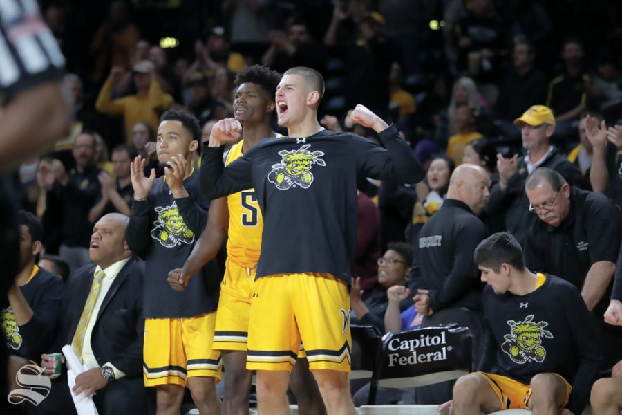 Wichita+States+Erik+Stevenson+cheers+on+his+teammates+during+their+game+against+Catawba+on+Oct.+30%2C+2018+at+Koch+Arena.