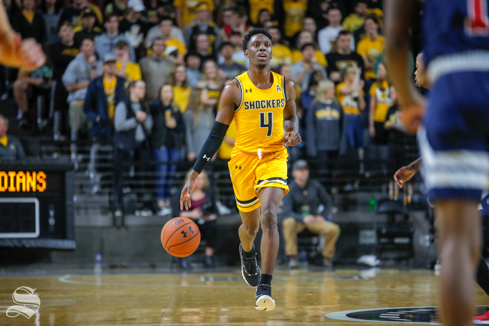Wichita State's Samajae Haynes-Jones dribbles down the court during their game against Catawba on Oct. 30, 2018 at Koch Arena.