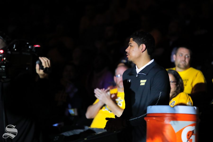 Wichita States Isaiah Poor Bear-Chandler walks onto the court at the start of the Black and Yellow Scrimmage on Oct. 6, 2018. Chandler did not suit up for the scrimmage because he is under concussion protocol.