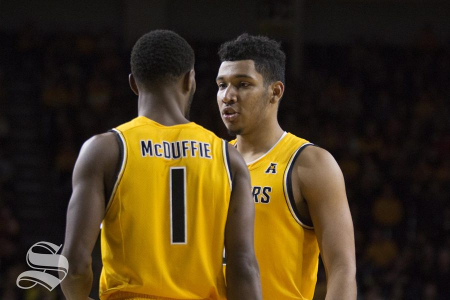 Wichita States Jaime Echenique  (21) speaks to Markis McDuffie (1) during the exhibition game against Catawba Oct. 29, 2018.