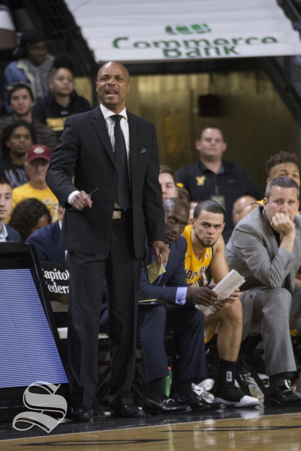 Wichita State Assistant Coach Isaac Brown calls a play during the exhibition game against Catawba.