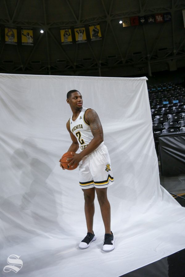 Jamarius Burton poses for a photo during Media Day at Charles Koch Arena.