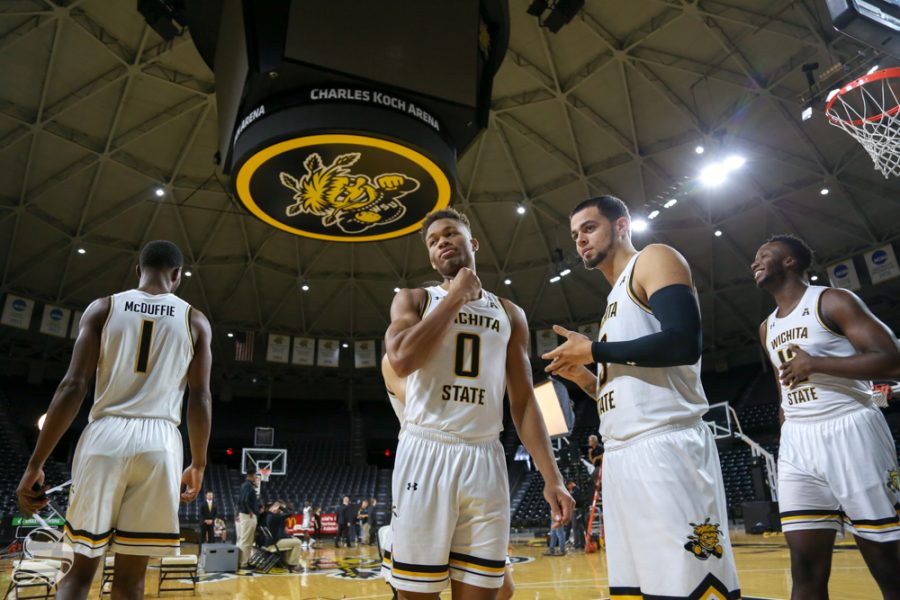McDuffie, Dennis, Torres, and Udeze hang out during media day at Koch Arena.