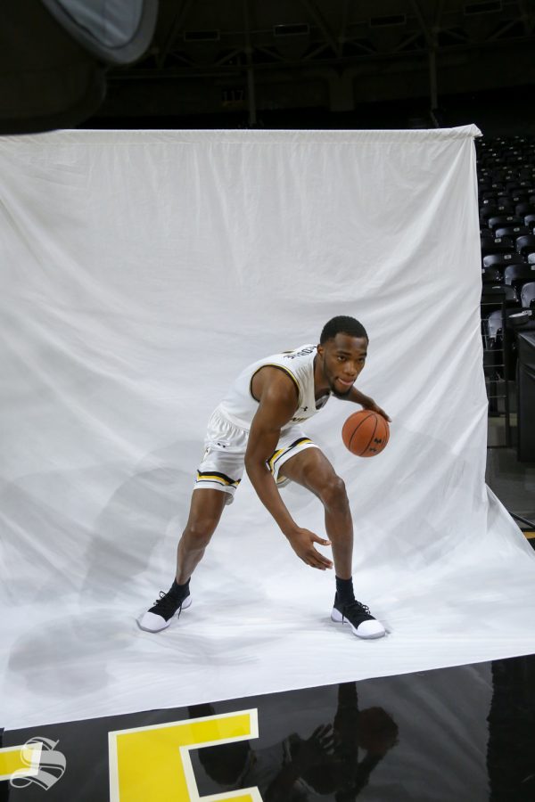 Markis McDuffie dribbles the ball for a photo during media day at Koch Arena.