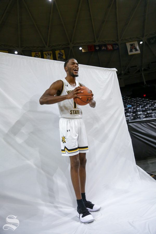 Markis McDuffie laughs  for a photo during media day at Koch Arena.