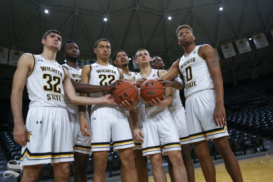 Wichita State players from the mens basketball team pose for a group shot during media day at Koch Arena.
