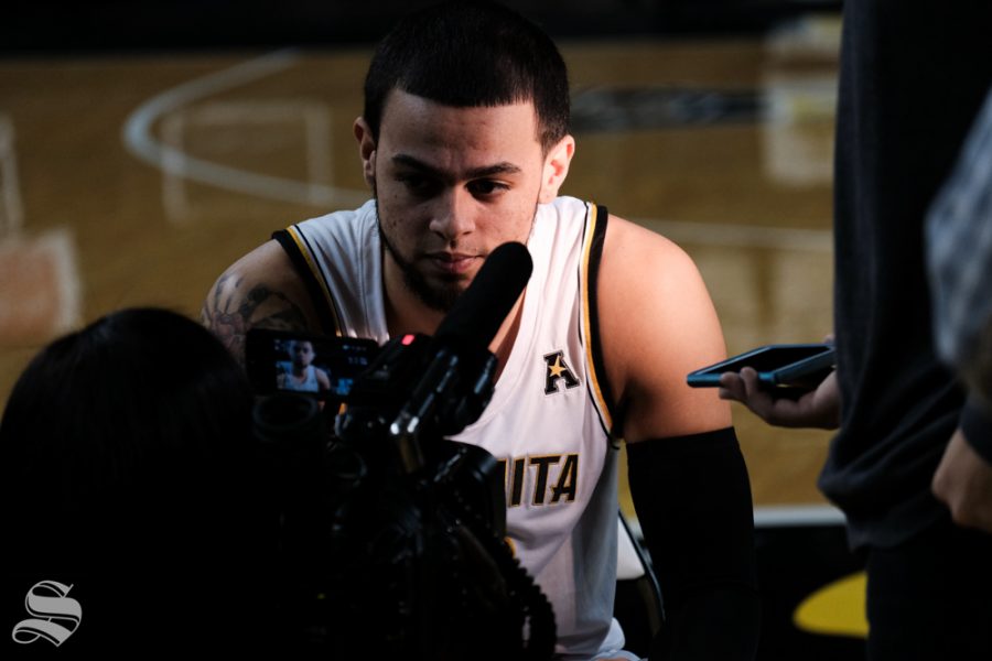 Wichita State guard Ricky Torres has an interview with a reporter at media day on Oct. 16, 2018.