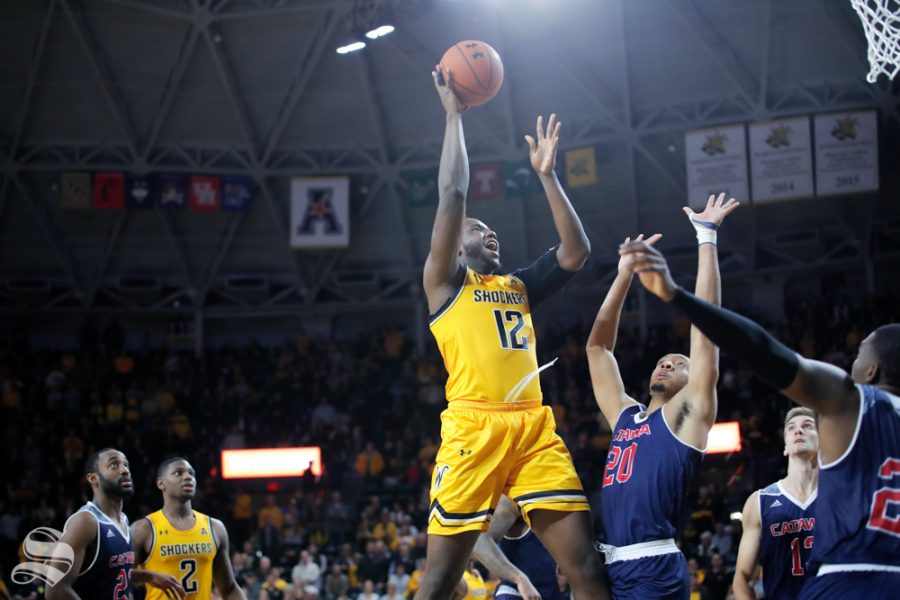 Wichita States Morris Udeze goes up for a basket during their game against Catawba on Oct. 30, 2018 at Koch Arena.