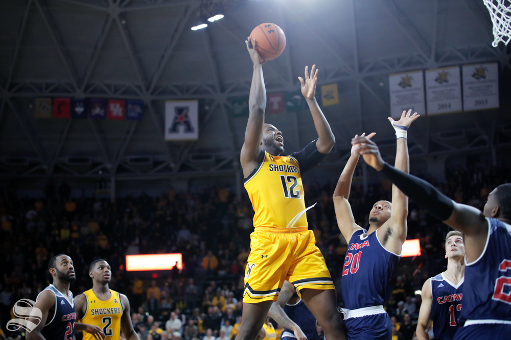 Wichita State's Morris Udeze goes up for a basket during their game against Catawba on Oct. 30, 2018 at Koch Arena.