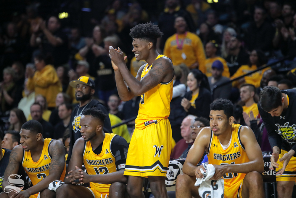 Wichita States Rod Brown cheers on his teammates during their game against Catawba on Oct. 30, 2018 at Koch Arena.