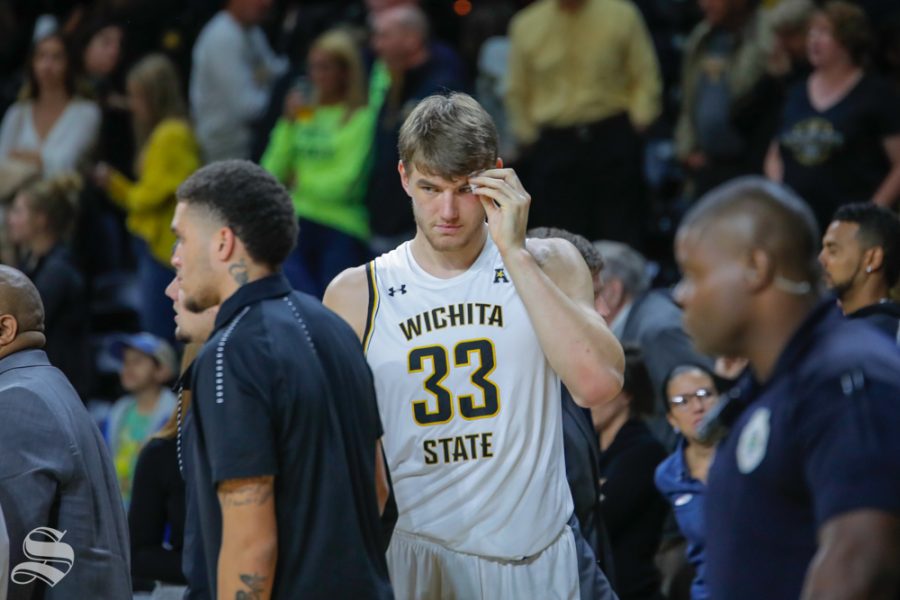 Wichita States Asbjørn Midtgaard holds his eye after being hit during their game against Louisiana Tech in Koch Arena on Nov. 6, 2018. Midtgaard will most likely receive stiches following the game.