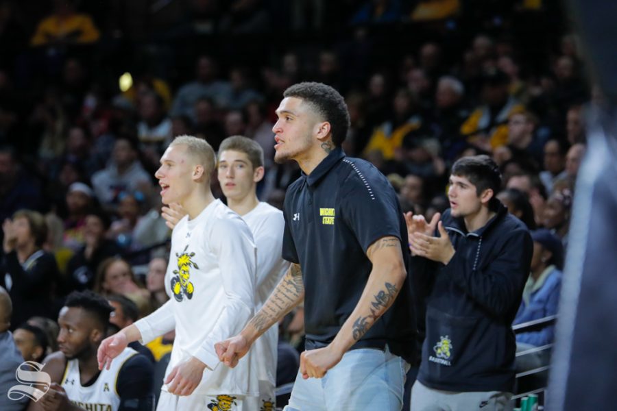 Wichita States Teddy Allen cheers on his teammate during their game against Louisiana Tech in Koch Arena on Nov. 6, 2018.