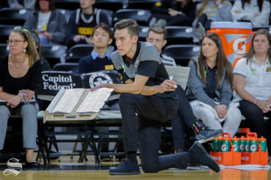 Wichita States Assistant Coach, Austin Hosto, stares down the court after his team loses a point.