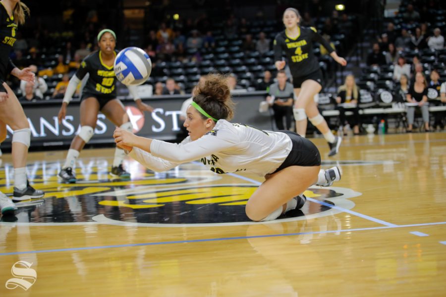 Wichita State libero Giorgia Civita dives for a ball during their game against SMU on Nov. 11, 2018 at Koch Arena.