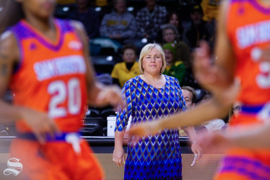 Wichita State's Head Coach Keitha Adams watches as her team moves the ball down the court at their game against Sam Houston State on November 14.