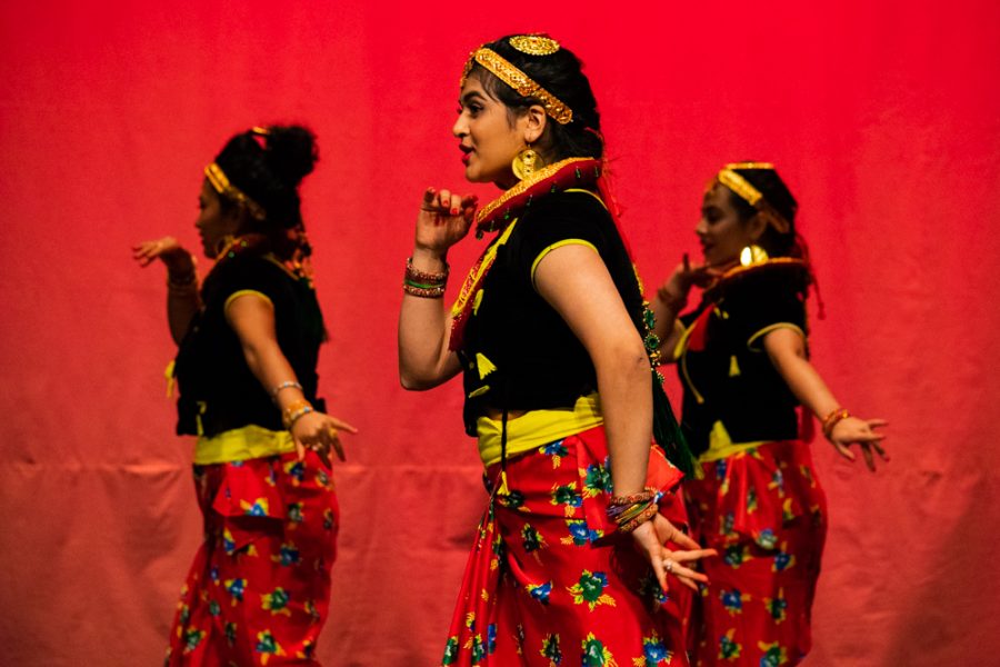 Three of Nepals contestants dancing during their performance at Cultura 2018. Cultura was held November 18 in the CAC theater.