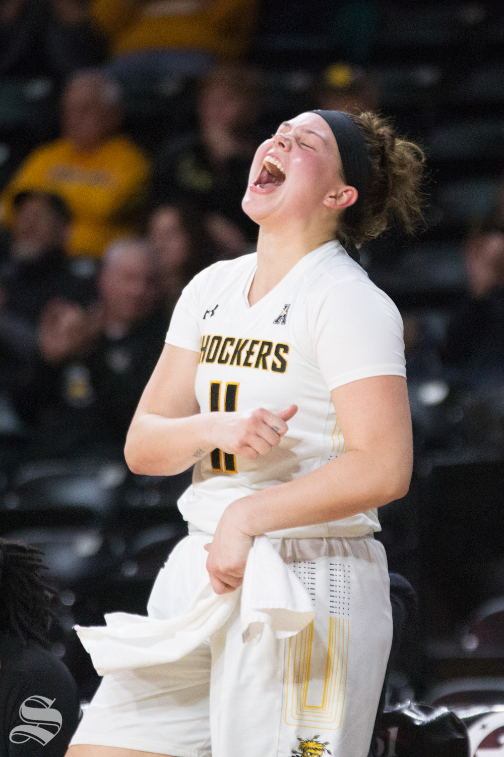 Wichita State senior Sabrina Lozada-Cabbage celebrates from the bench during the season opener against Arkansas-Pine Bluff.