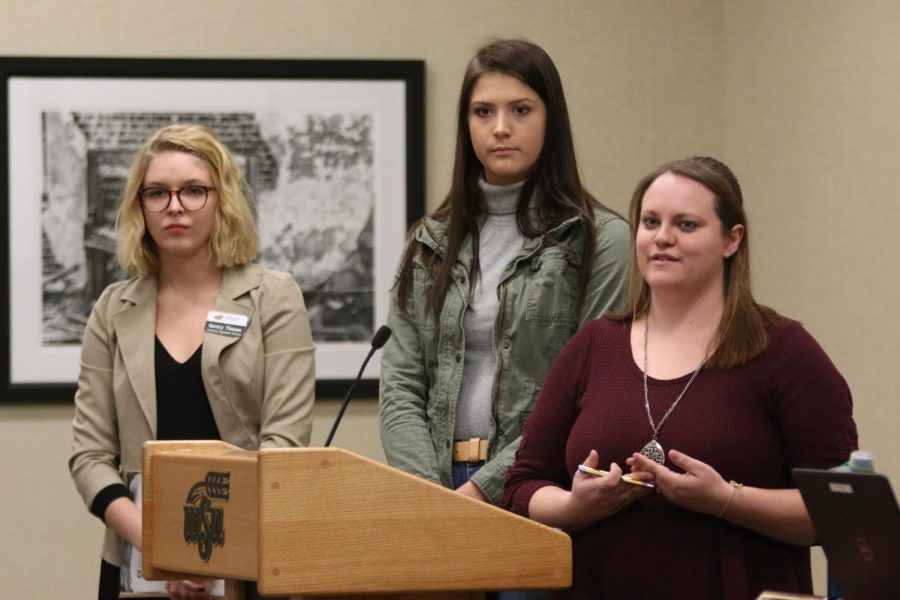 Members of the infrastructure steering committee Gentry Thiesen (left), Hannah Foster (center), and Ashley Estes (right) present during open forum of the Student Government Association meeting Wednesday, Nov. 14.