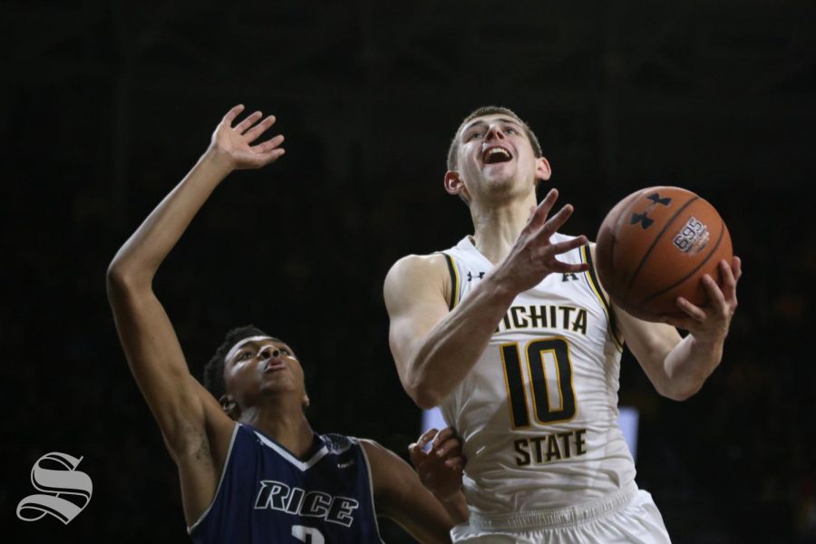 Wichita State freshman Erik Stevenson goes up for a basket during the game against Rice. 