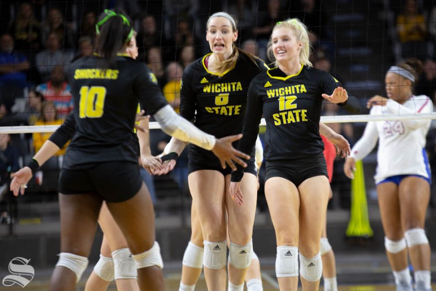 Wichita States Emma Wright (left) and Regan Stiawalt (right) celebrate. Wichita State lost to Southern Methodist in three sets Sunday at Charles Koch Arena.