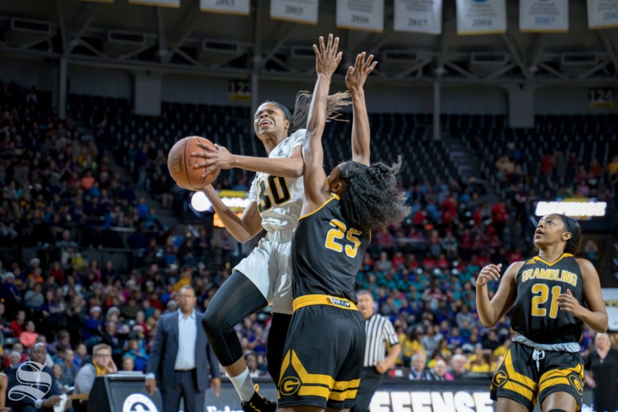Wichita State senior Cesaria Ambrosio goes up for a lay-up during their game against Grambling State on Dec. 11, 2018 at Koch Arena.