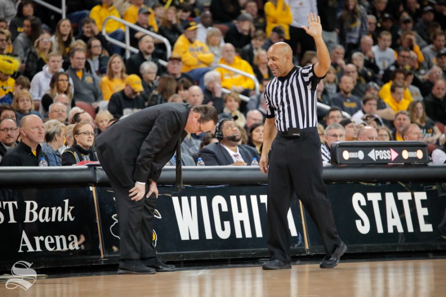 Head Coach Gregg Marshall bends over after a call is made against Wichita State during their game against Southern Miss on Dec. 15, 2018 at INTRUST Bank Arena.