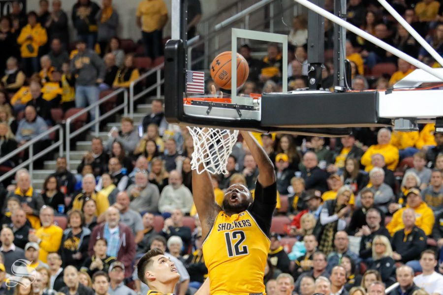 Wichita State freshman Morris Udeze dunks the ball during their game on Dec. 15, 2018 at INTRUST Bank Arena.