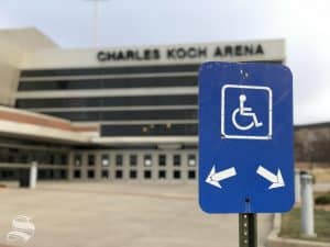 An ADA parking sign outside of Koch Arena.