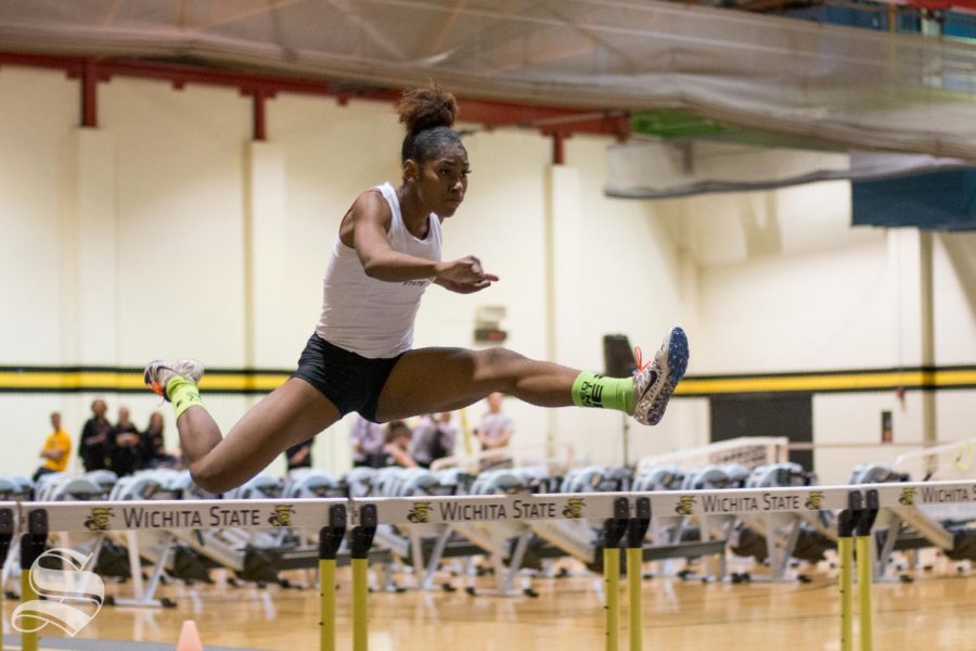 Wichita States Tianna Holmes competes in the 60m hurdles during the intrasquad meet Friday, Dec. 7, 2018.