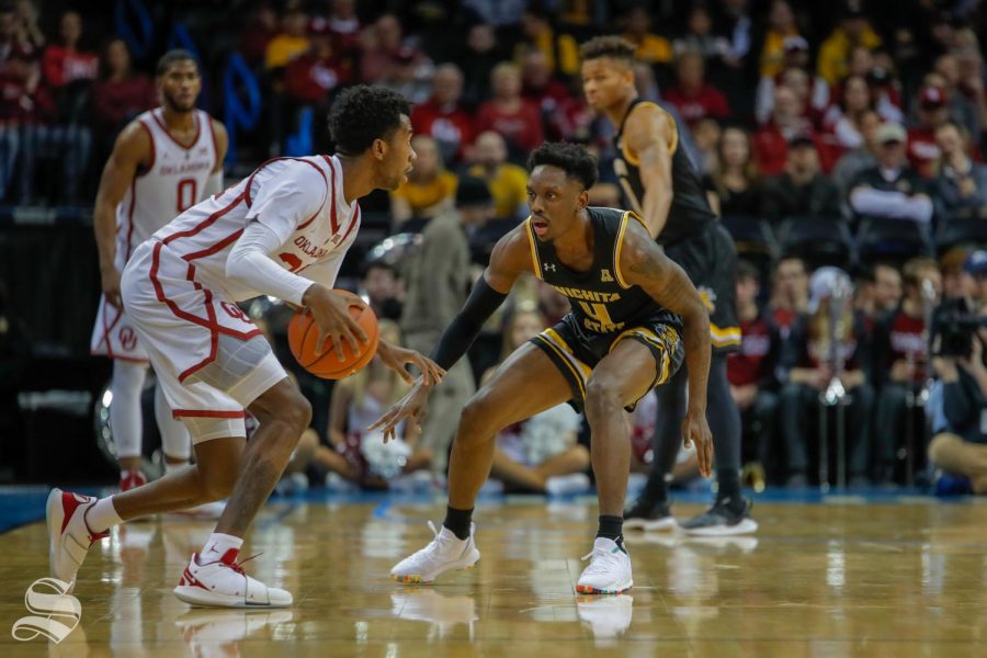 Wichita States Samajae Haynes-Jones defends Oklahoma guard Jamal Bieniemy. 