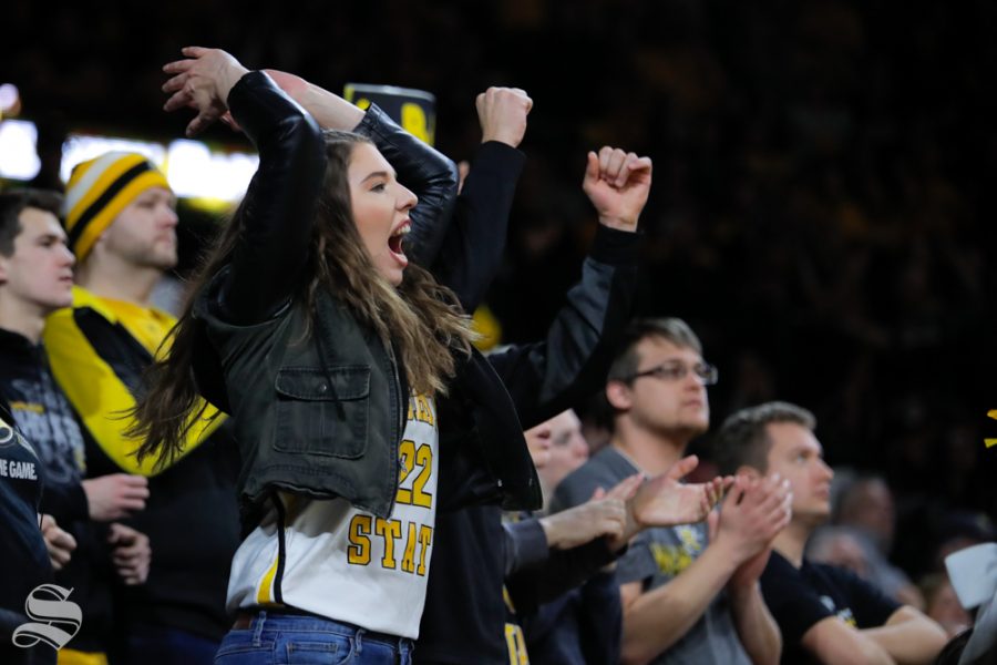 Fans cheer during the game against Cincinnati on Jan. 19, 2019 at Charles Koch Arena. (Photo by Joseph Barringhaus/The Sunflower).