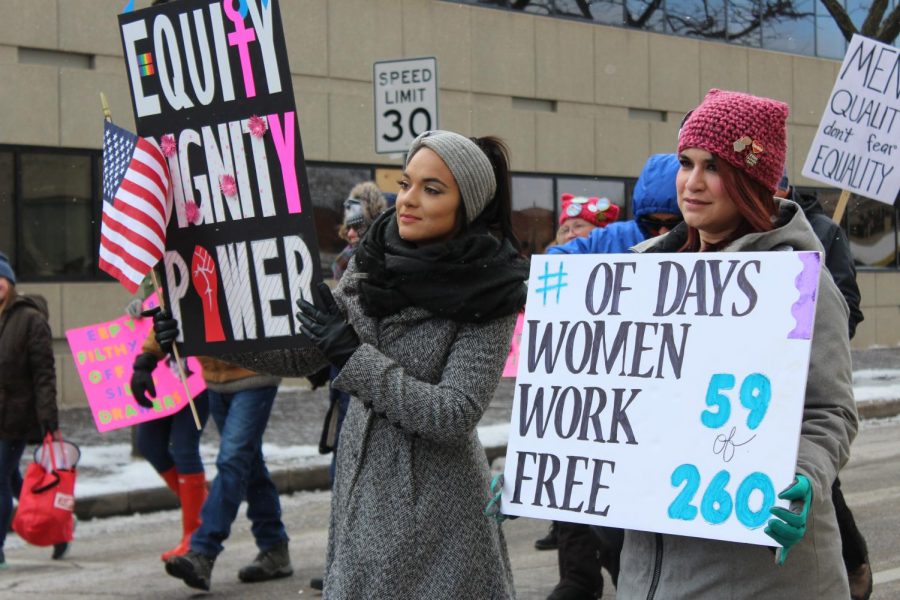  Women matched in Wichita for the third annual Women's March in 2019 - Air Capital. Luisa Taylor (right) spoke at the rally after the march.