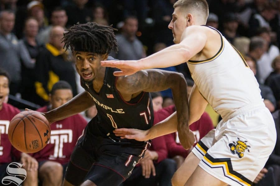 Temples Quinton Rose moves past Wichita States Erik Stevenson.